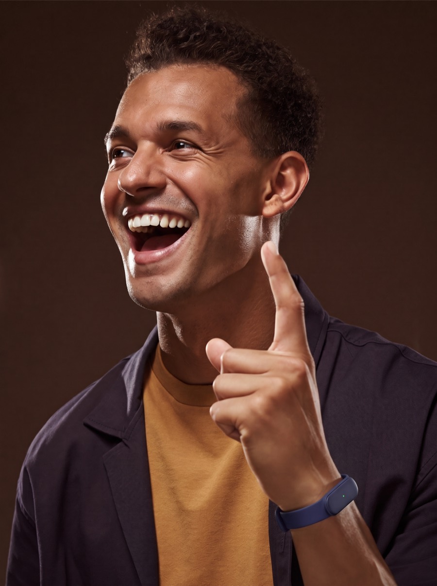 An energetic young man mid-idea, wearing the Larkin band