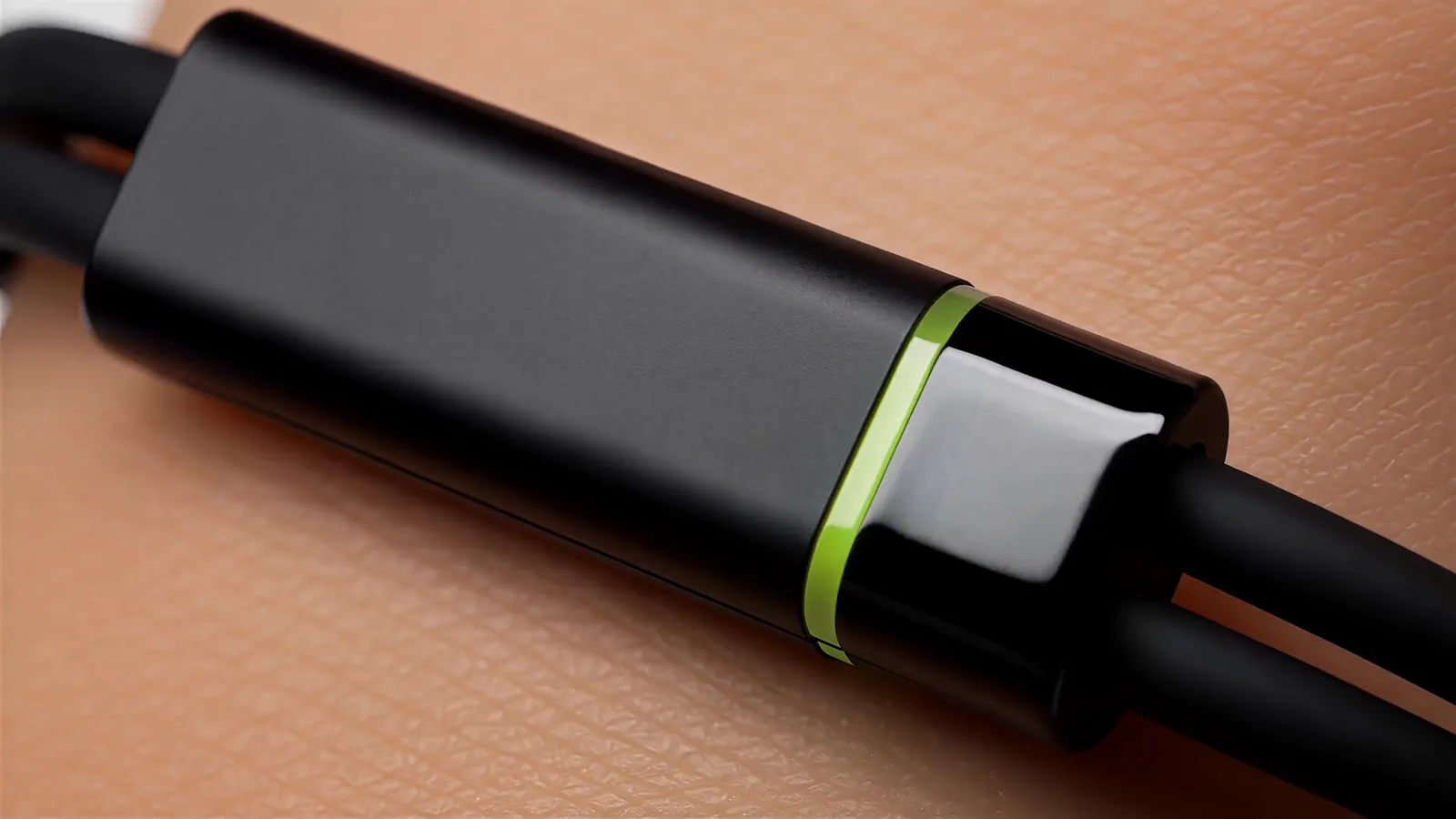 The Larkin module close up on a wrist, its thin lime light on